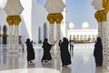 Grand Mosque, black dressed women in hijab taking selfies in Sheikh Zayed Grand Mosque, Abu Dhabi
