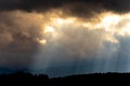 Black clouds and sun rays Royalty Free Stock Photo