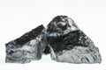 Black coal mine close-up with large depth of field. Anthracite coal bar isolated on white background Royalty Free Stock Photo