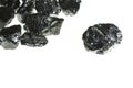 Black coal mine close-up with large depth of field. Anthracite coal bar isolated on white background Royalty Free Stock Photo