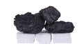 Black coal and white firelighter Royalty Free Stock Photo