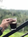 black coffe serve with beauty rice fields view