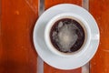 Black Coffee , Amaricano , White coffee cup , background wooden , Top view