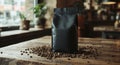 Black Coffee Bag with Roasted Coffee Bean on a Wooden Table Royalty Free Stock Photo