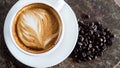 Black coffee bean, white round shape coffee cup on old wooden table top view. lifestyle concept Royalty Free Stock Photo