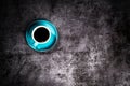 black coffee in a blue ceramic cup on the old gray cement floor Royalty Free Stock Photo