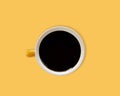 Black coffee in a bright orange cup, white inside on a flat lay and isolated yellow with clipping path Taken in the studio with Royalty Free Stock Photo