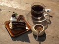 Black coffee with chocolate cake