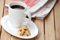 Black coffee with chocolate chip biscuits on side Royalty Free Stock Photo