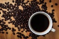 Black coffee and coffee bean on wood texture background. breakfast on morning or coffee time.