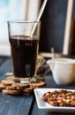 Black coffee cup with biscuits and chocolate Royalty Free Stock Photo