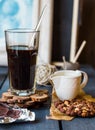 Black coffee cup with biscuits and chocolate Royalty Free Stock Photo
