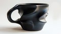 A black coffee cup with a curved handle on white surface, AI