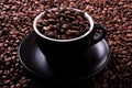 Black coffee cup filled with roasted beans background