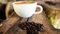 Black coffee cup on old wooden table top view. note book and pencil. lifestyle concept Royalty Free Stock Photo