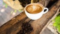 Black coffee cup on old wooden table top view. note book and pencil. lifestyle concept Royalty Free Stock Photo