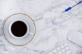 Black coffee on the desk with a computer, mouse Keyboard, book note, and pen Concept of working at home, personal business Royalty Free Stock Photo