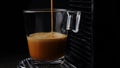 Black coffee with froth. Making black espresso or ristretto in automatic coffee machine capsules.