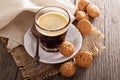 Black coffee in a glass with almond cookies Royalty Free Stock Photo