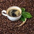 Black coffee green leaves coffee beans background square Royalty Free Stock Photo