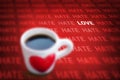 Black coffee and heart symbol cup with words hate and love Royalty Free Stock Photo