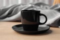 Black coffee mug mockup on the linen napkin Royalty Free Stock Photo