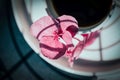 Black coffee and pink hydrangea or hortensia flower, shadow pattern. Top view