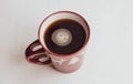 Black Coffee in red ceramic cup isolated on a white. Top view Royalty Free Stock Photo