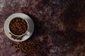 Black coffee seed for morning menu in white ceramic cup with coffee beans roasted Royalty Free Stock Photo