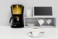 Black coffee in a white ceramic mug with gold rim and saucer. Blur Black and gold espresso machine  and Coffee cup storage on Royalty Free Stock Photo