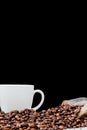 Black coffee in white cup and coffee beans on black background. Top view, space for text Royalty Free Stock Photo