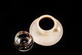 Black coffee in the white cup and a glass of sambuca with coffee Royalty Free Stock Photo