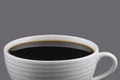 Black coffee in white cup isolated on gray background. Save with clipping path Royalty Free Stock Photo