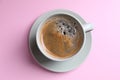 Black coffee white cup isolated on pink background Royalty Free Stock Photo