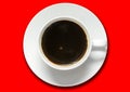 black coffee in white coffee cup isolated on red background top view Royalty Free Stock Photo