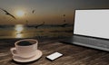 Black coffee in white cup on wooden surface table. Blur blank screen labtop , Black smartphone  white screen  on table. Copy space Royalty Free Stock Photo