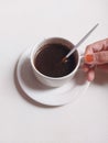 Black coffee on white porcelain cup Royalty Free Stock Photo