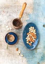 Black coffeee with almonds and pistachios over Royalty Free Stock Photo