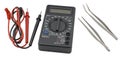 Black color digital multimeter and pincette