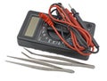 Black color digital multimeter and pincette