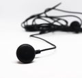 Black Color Earphones Isolated on White background Royalty Free Stock Photo