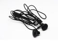 Black Color Earphones Isolated on White background Royalty Free Stock Photo