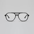 Black color glasses isolated on gray background, ideal photo for display or advertising sign or for a web banner Royalty Free Stock Photo