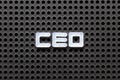 Black pegboard with white letter in word CEO abbreviation of Chief Executive Officer