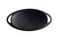 Black colored, empty clean cast iron roasting pan with handle on white surface Royalty Free Stock Photo