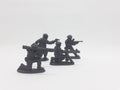 Black Colored Plastic Army Men with Gun Toys for Kids in White  Background 38 Royalty Free Stock Photo