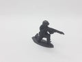 Black Colored Plastic Army Men with Gun Toys for Kids in White Isolated Background 29 Royalty Free Stock Photo