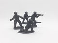 Black Colored Plastic Army Men with Gun Toys for Kids in White Isolated Background 39 Royalty Free Stock Photo