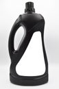 Black colored plastic detergent bottle. Cosmetic, container. Royalty Free Stock Photo