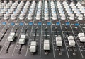 Black colour dusty audio sound mixer console with many buttons